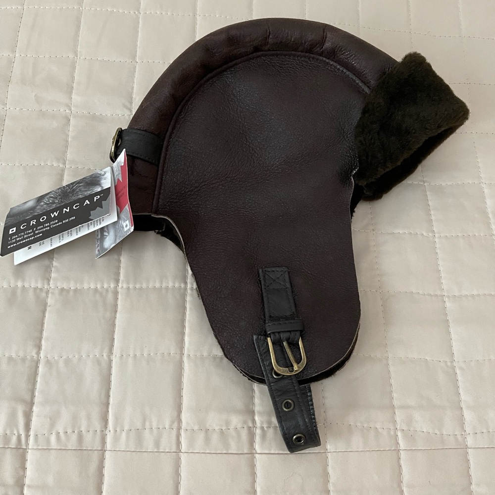 NWT Genuine Sheepskin Crowncap Trapper hat.